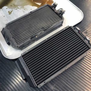Original Carrera style cooler from the 80’s 911 to a new CSF 8168 oil cooler